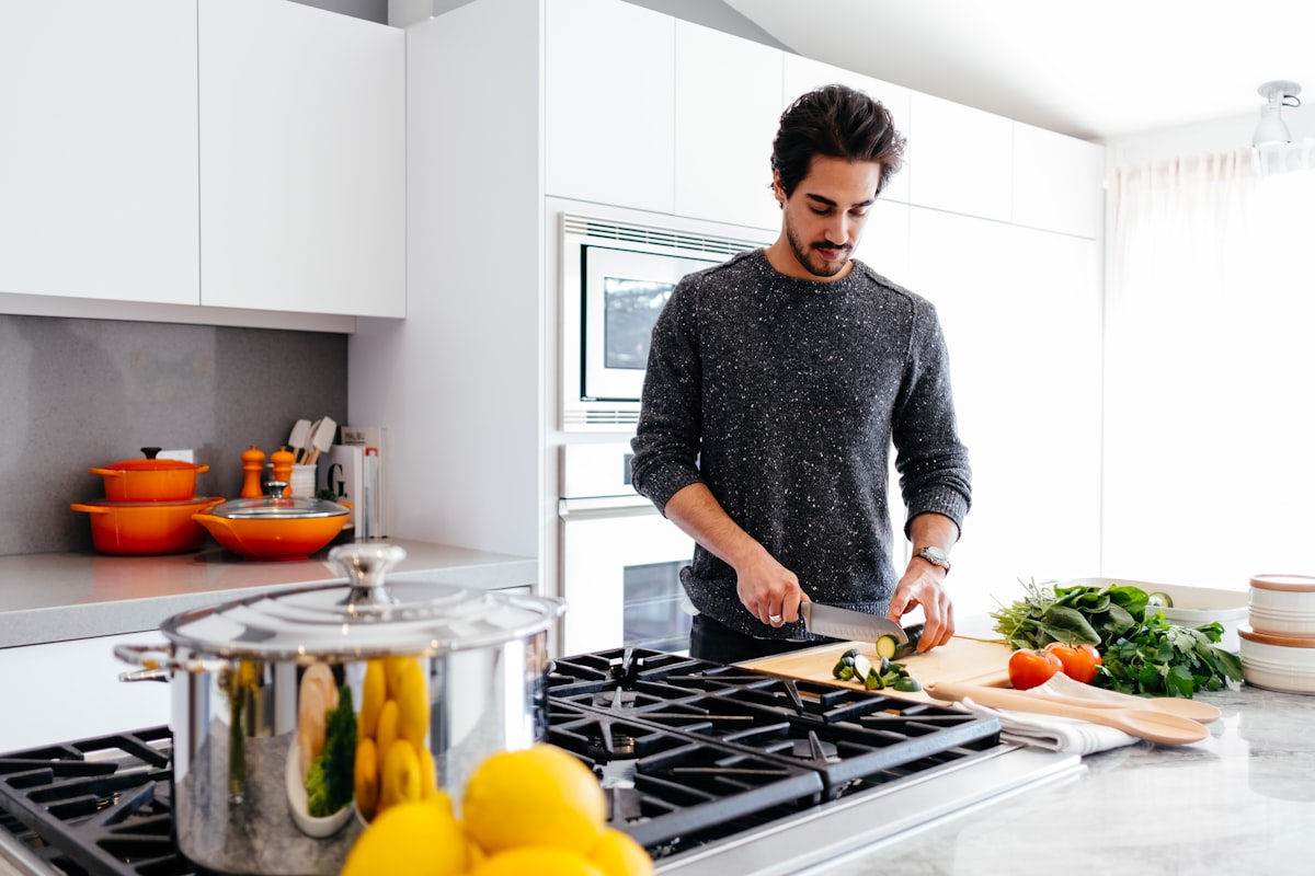 Man preparing meal in kitchen